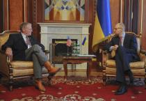 Sen. Jim Inhofe (R-Okla.), ranking member of the Senate Armed Services Committee (SASC), speaks with Prime Minister Areseniy Yatsenyuk of Ukraine about recent Russian aggression against Ukraine and energy security on Oct. 28, 2014.